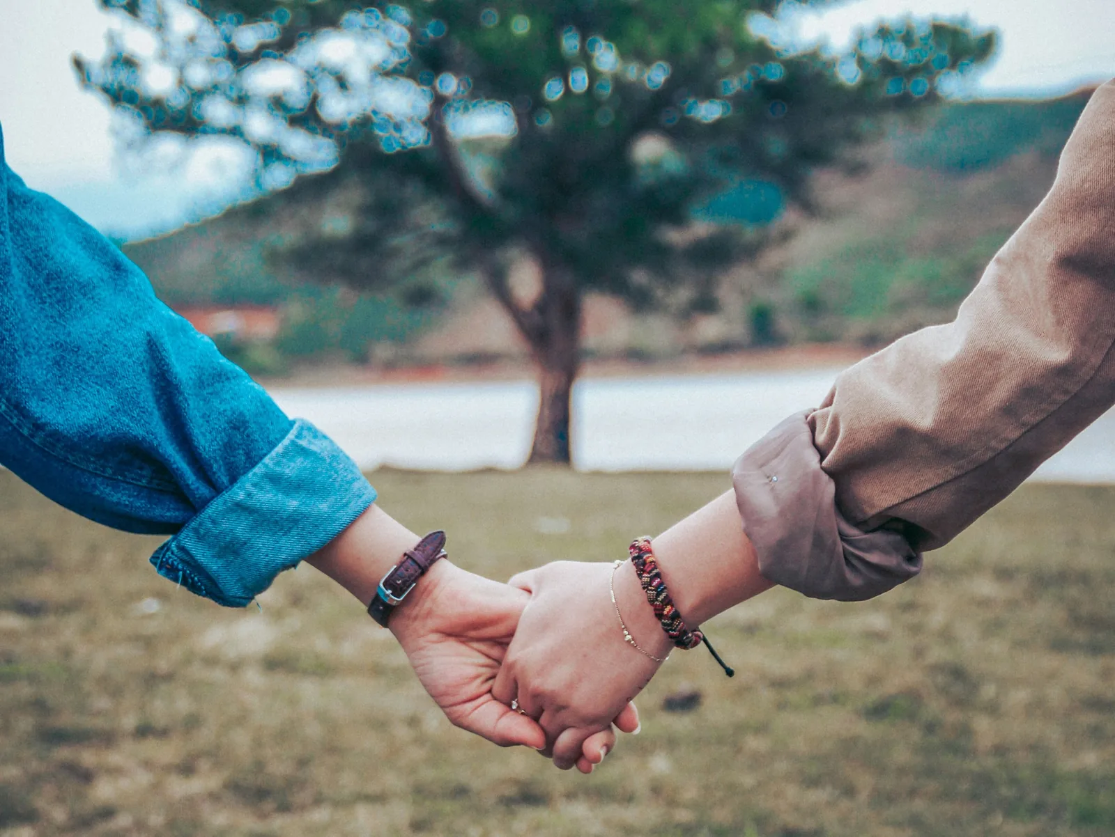 Couple holding hands outdoors